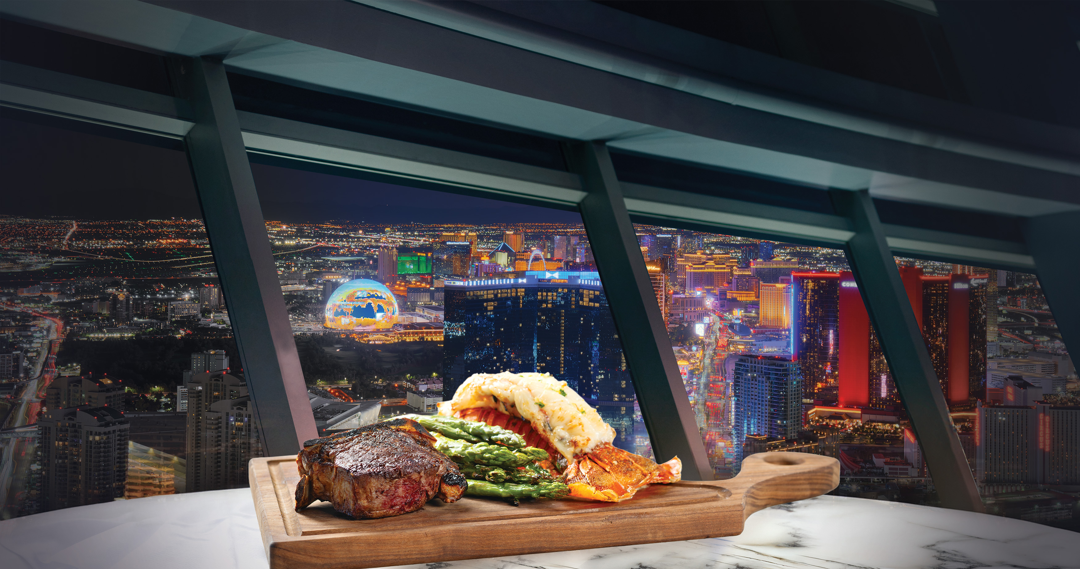 Dining at Top of the World steakhouse